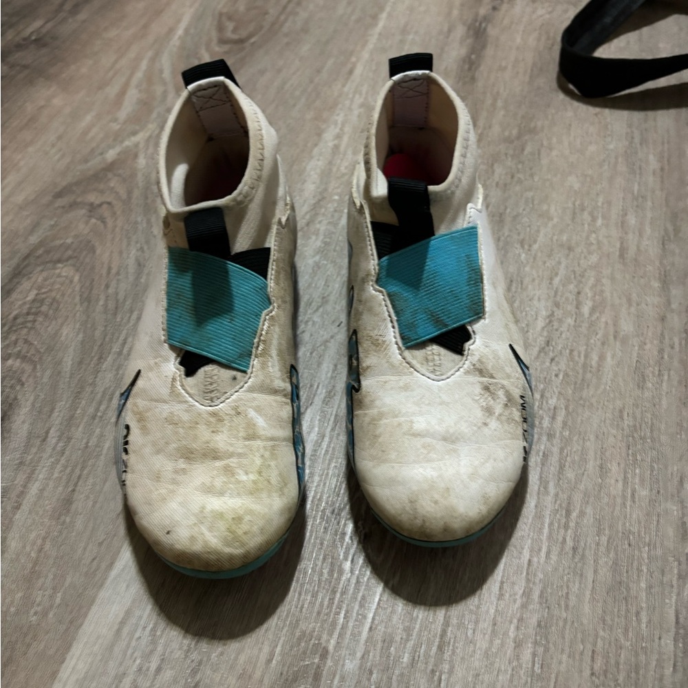 Kids size 1.5 Nike soccer cleats. Worn 1 season but stained even after washing.